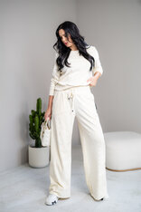 ROZŠÍRENÉ NOHAVICE “EVELYN” HLADKÉ